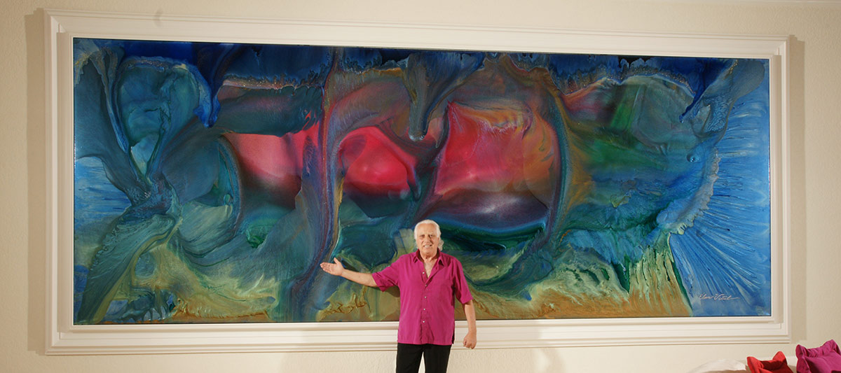 Picture of Elan Vital next to monumental painting in Palm Desert